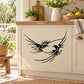 Black bird couple in flight wall decal with stylized wings on cabinet door