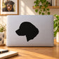 Black Rottweiler head silhouette decal on a light laptop lid