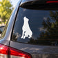 Howling rottweiler silhouette decal on car rear window, white dog graphic