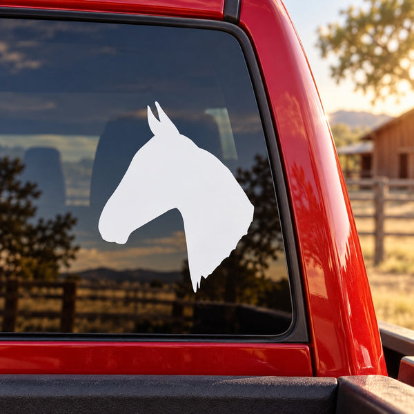Horse head decal on car window, white silhouette