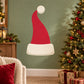 Santa hat sticker with red fabric, white trim, and round white pom-pom