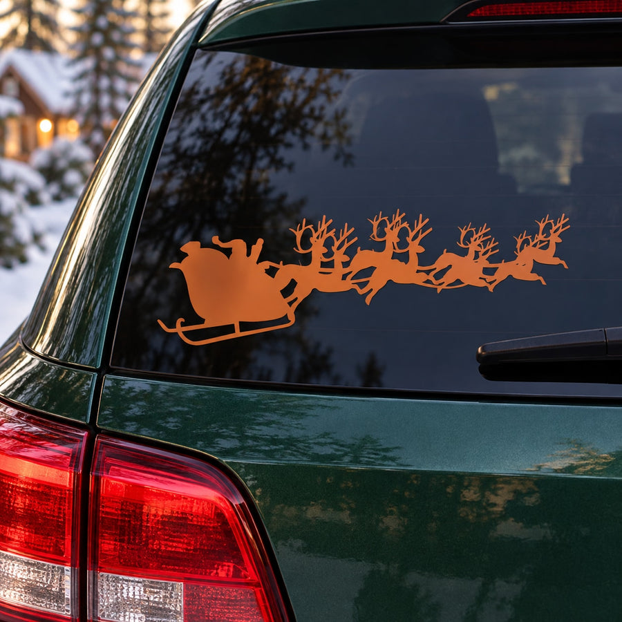 Orange Santa sleigh and reindeer decal on car rear window