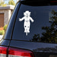 Sacrecrow decal: white scarecrow cartoon figure on a dark car window.