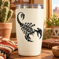 White tumbler with black scorpion decal, intricate swirling pattern