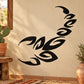 Abstract scorpion wall decal, black swirl design on a beige surface