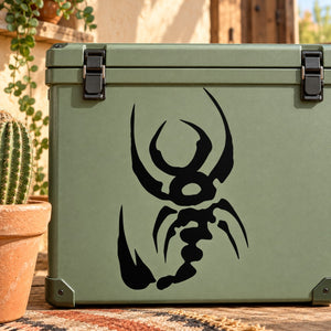 Black scorpion and tail decal on green surface