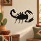 Black scorpion-shaped vinyl decal with stylized claws and arched tail silhouette