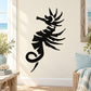 Black seahorse decal with decorative tail on wall