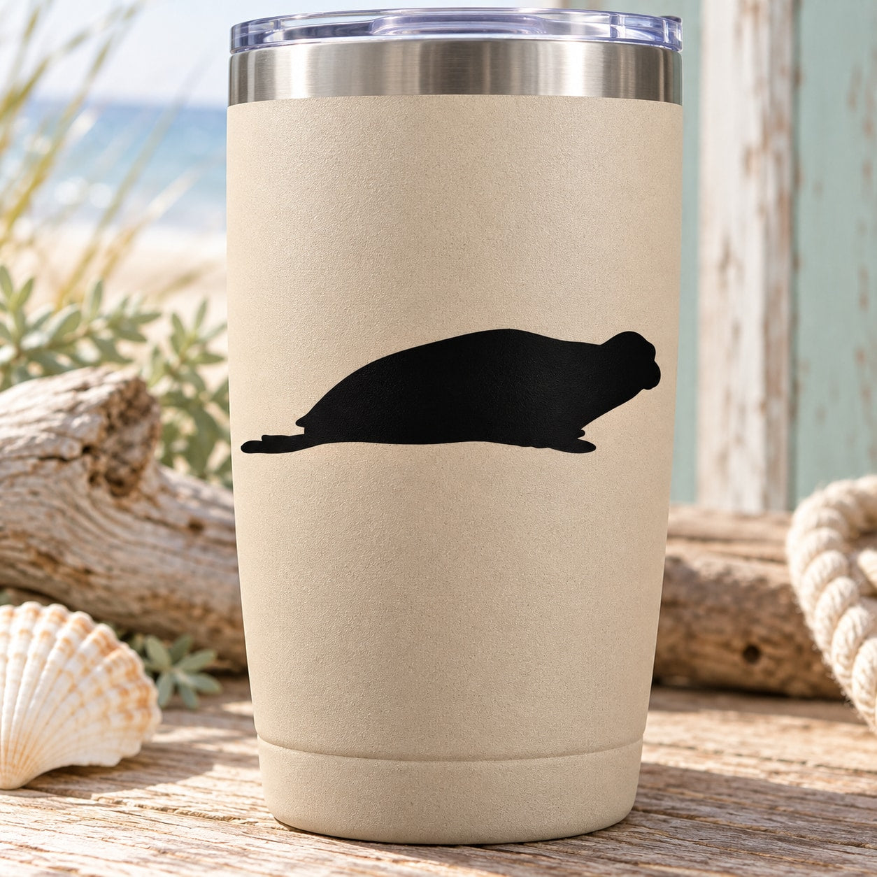 Insulated tumbler with black seal decal, stainless steel lid