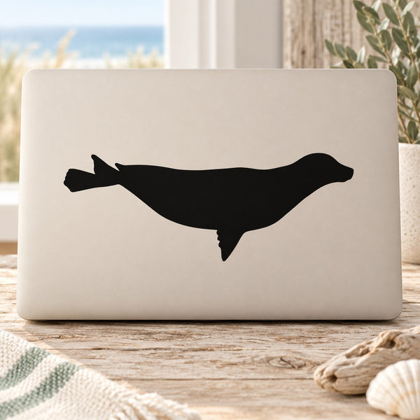 Gliding seal silhouette decal, black cutout design with streamlined flippers