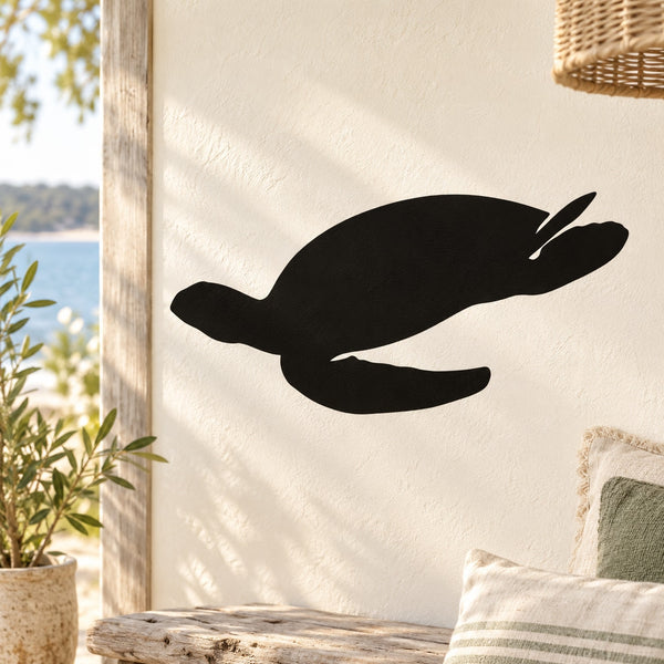 Sea turtle diving decal, black silhouette on light surface
