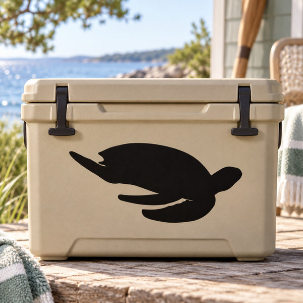 Sea turtle watching decal, black turtle silhouette on light surface.