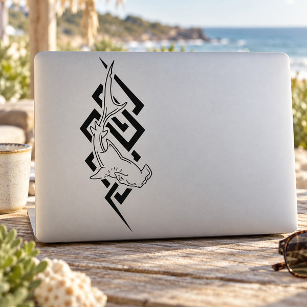 Laptop with black tribal hammerhead shark decal on the lid