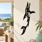 Black dolphin jumping wall decal with stylized wings and fin detail