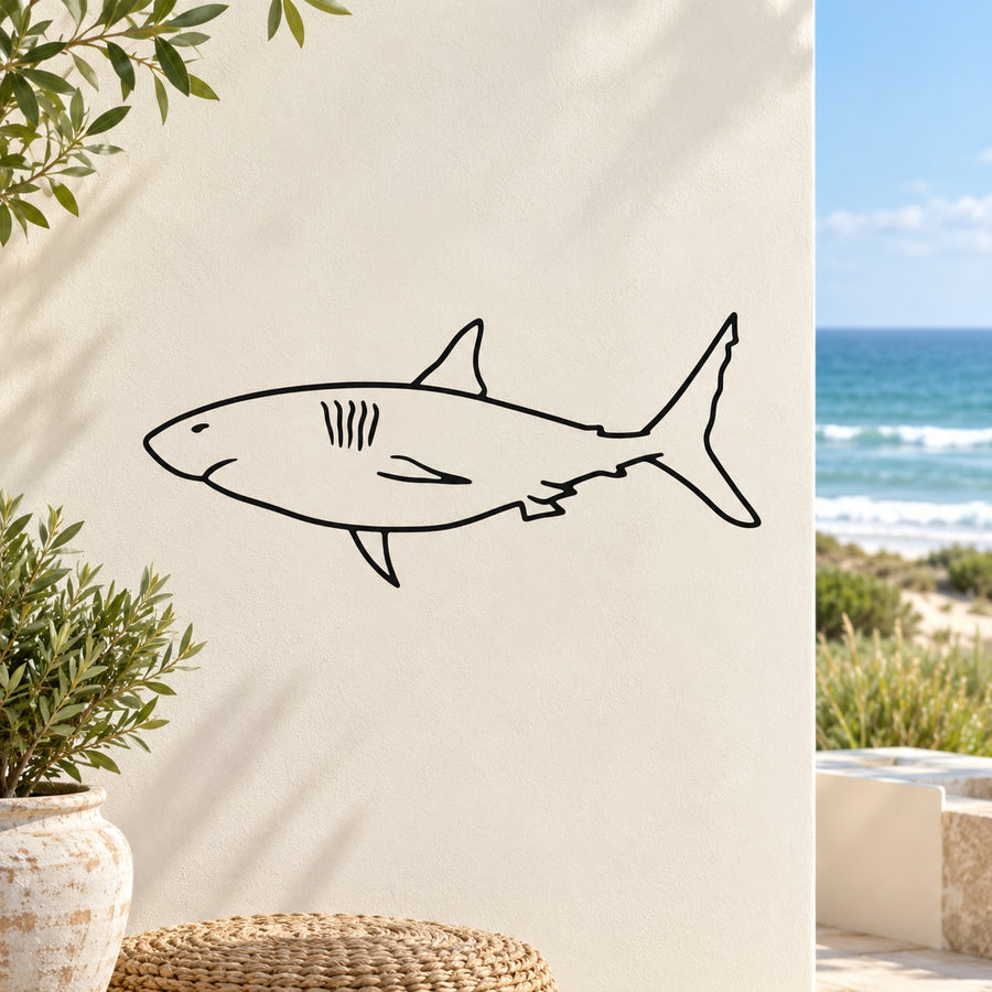Shark decal sticker with simple black line-art outline, fin and tail details