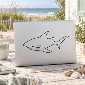 Great white shark line-art decal on light surface
