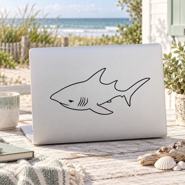 Great white shark line-art decal on light surface