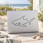 Great white shark line-art decal on light surface