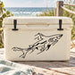 Great white shark decal graphic on light cooler lid, black outline.
