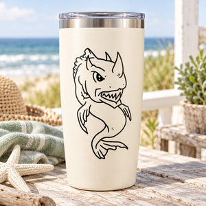 Horned shark decal with bold black outline on light-colored tumbler