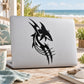 Black danger shark razor decal with tribal-style spines graphic on laptop lid