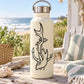 Cream water bottle with black anchor wrap shark decal