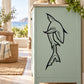 Turn over shark decal, black outline of a swimming shark on a light surface