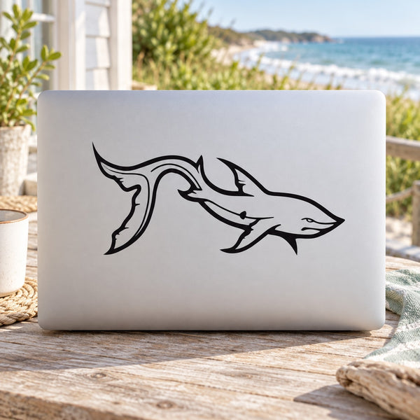 Shark decal with flowing tail, black line art style on light surface