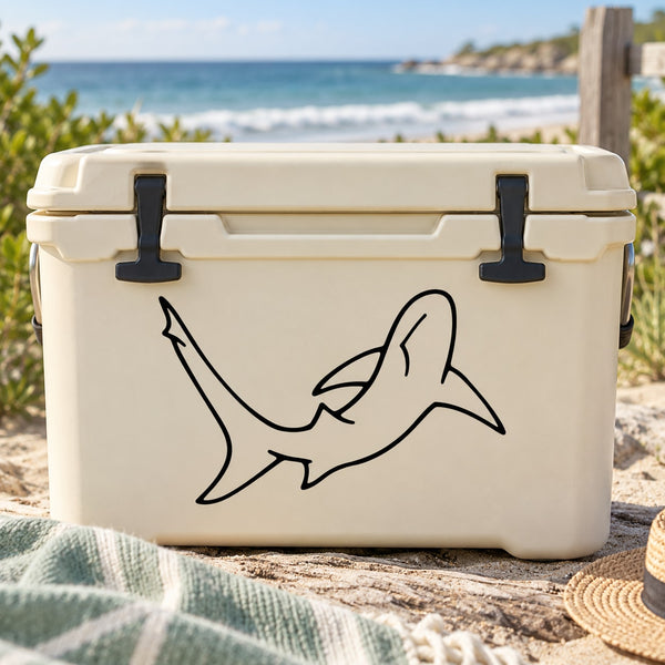 Black line-art shark decal on a white cooler lid