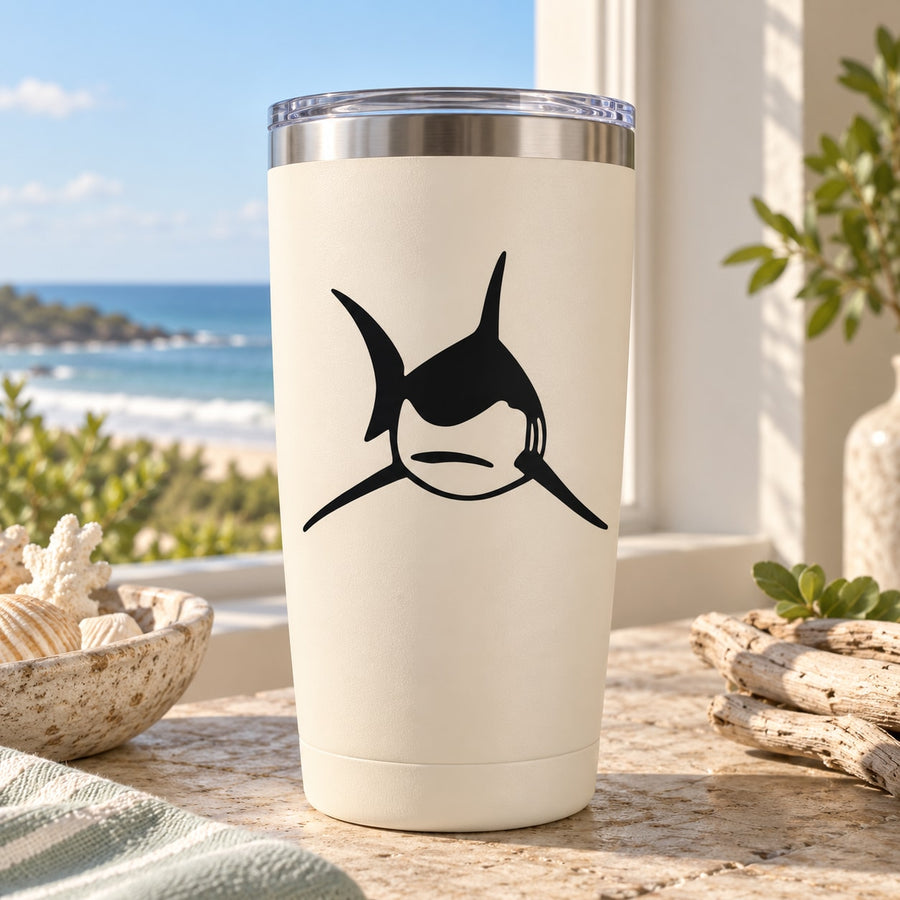 Mako shark decal featuring a black fin silhouette on a light tumbler