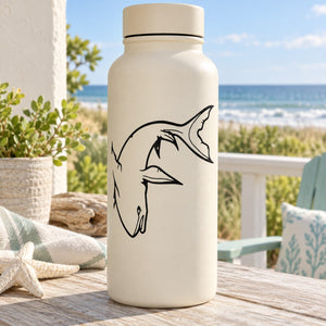 Shark decal with black outline on a white bottle