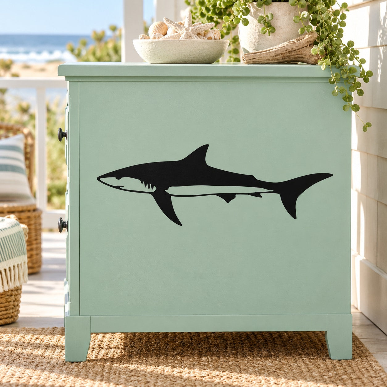 Baby shark decal: black cartoon shark silhouette on light green furniture panel