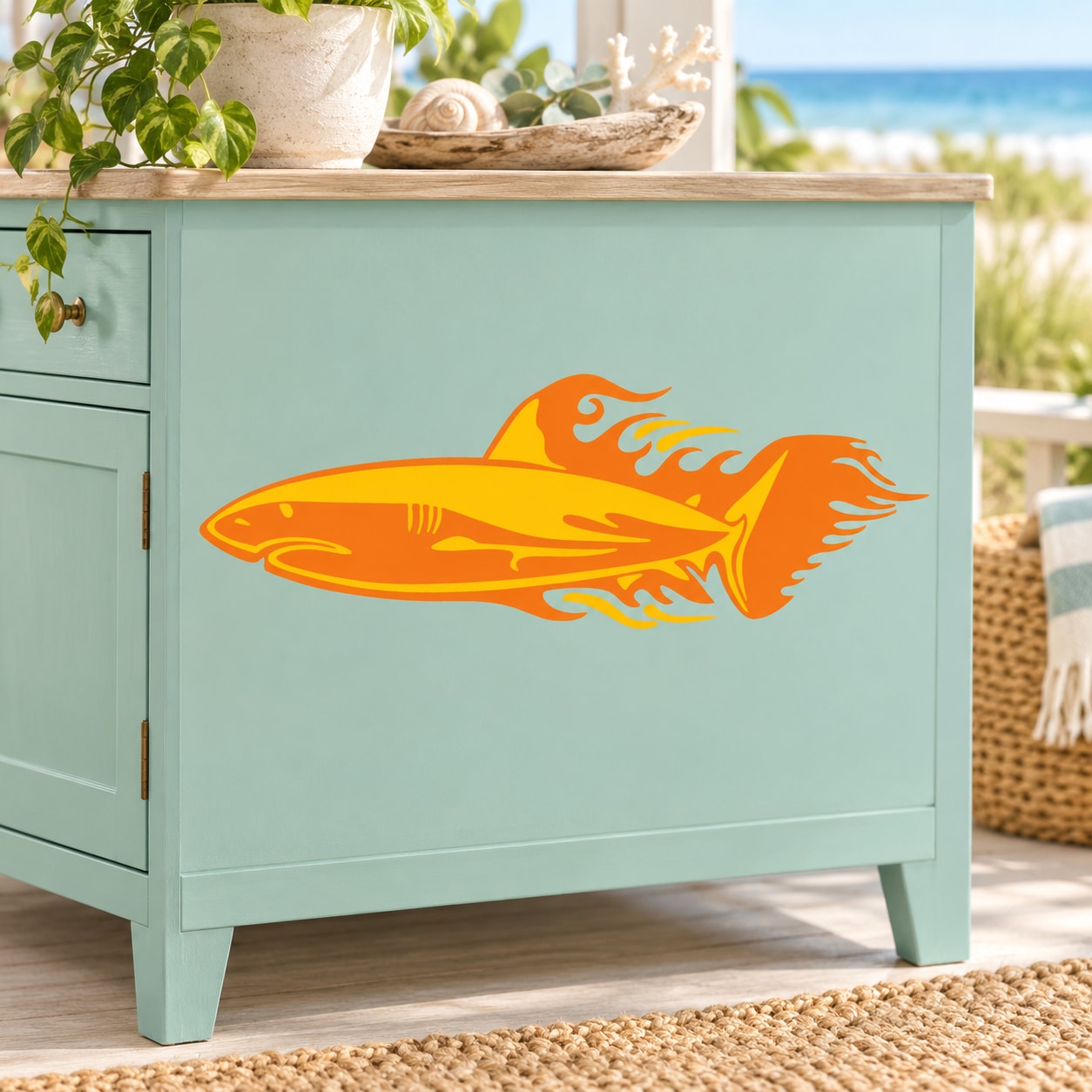 Orange shark decal on light blue cabinet door