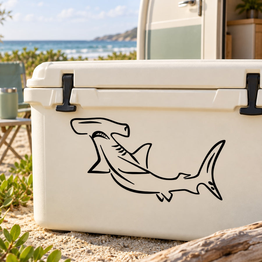 Lunging hammerhead shark decal with black outline on a white cooler