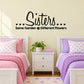 Wall decal with script text “Sisters, Same Garden Different Flowers” and small hearts
