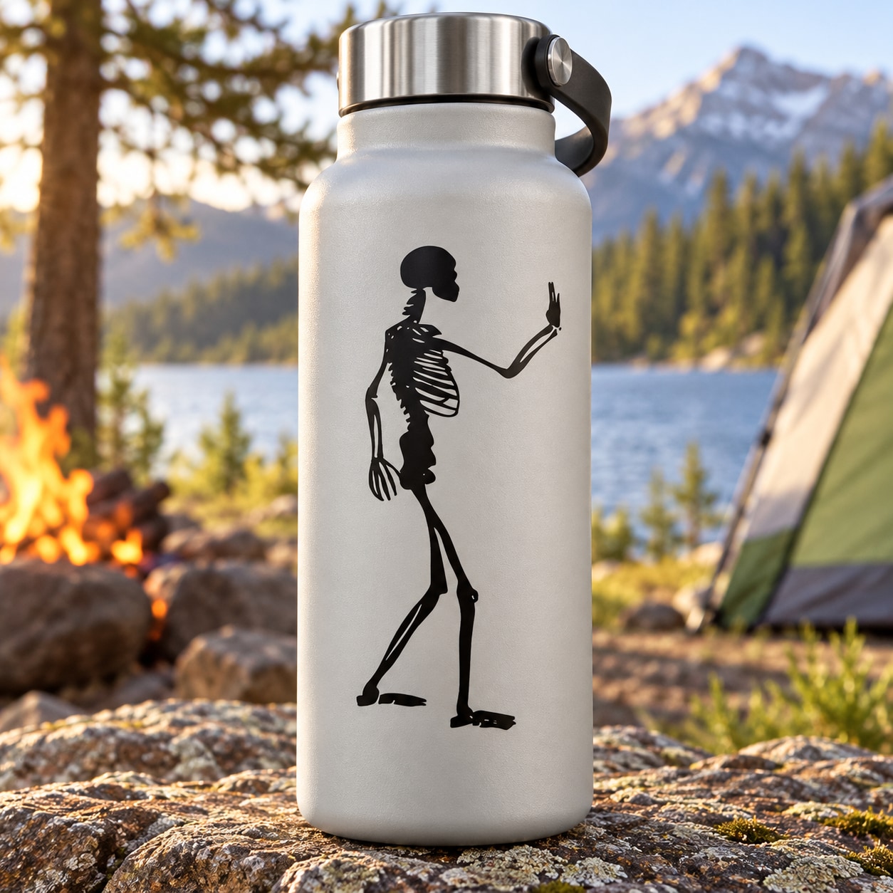 Skeleton waving hello decal on white water bottle with silver lid and handle