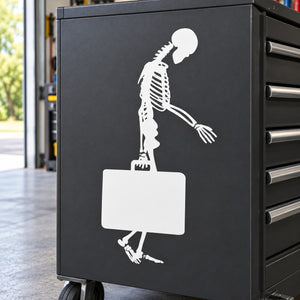 Skeleton carrying briefcase decal, white on dark rectangular surface