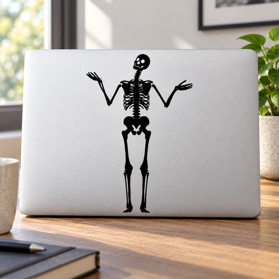 Black skeleton shrugging decal on white rectangular background