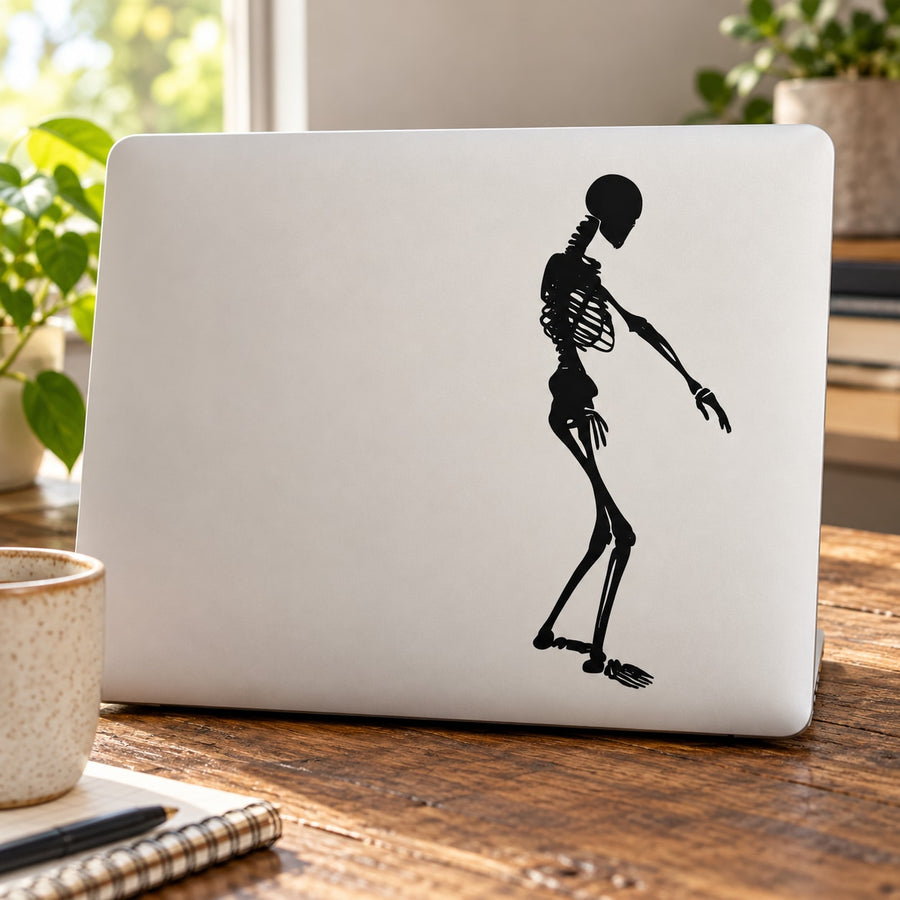 Skeleton dancing silhouette wall decal, black figure on white rectangular sheet