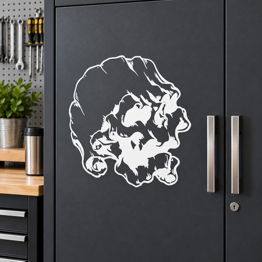 Skull decal vinyl sticker with bold white skull graphic on dark surface