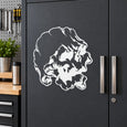 Skull decal vinyl sticker with bold white skull graphic on dark surface