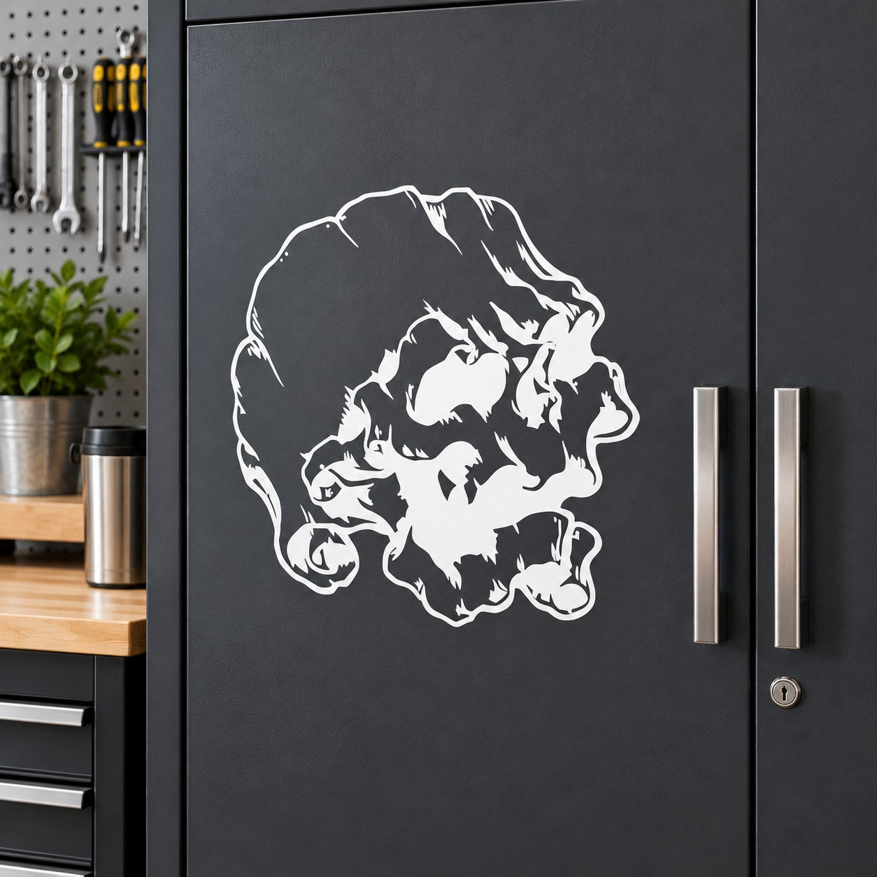 Skull decal vinyl sticker with bold white skull graphic on dark surface