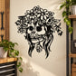 Black skull decal with floral crown and long hair, white and black outline