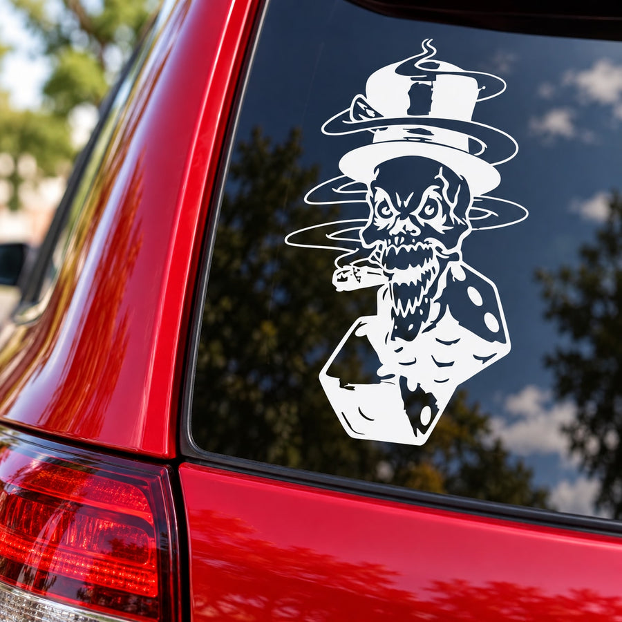 White skull wearing top hat graphic decal on dark car window