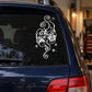 Vinyl car decal of white skulls with swirls and stars