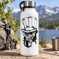 White bottle with black skull wearing top hat and beard decal