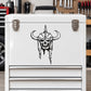 Black skull face vinyl wall decal with curved horns and bold outline