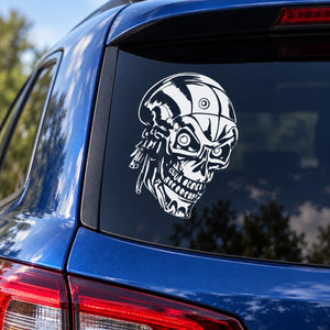 Skull vinyl decal featuring astronaut helmet graphic on car window