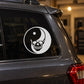Skull yin-yang vinyl decal sticker in a white circle on a dark surface