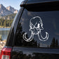 Skull vinyl decal with white graphic on car window